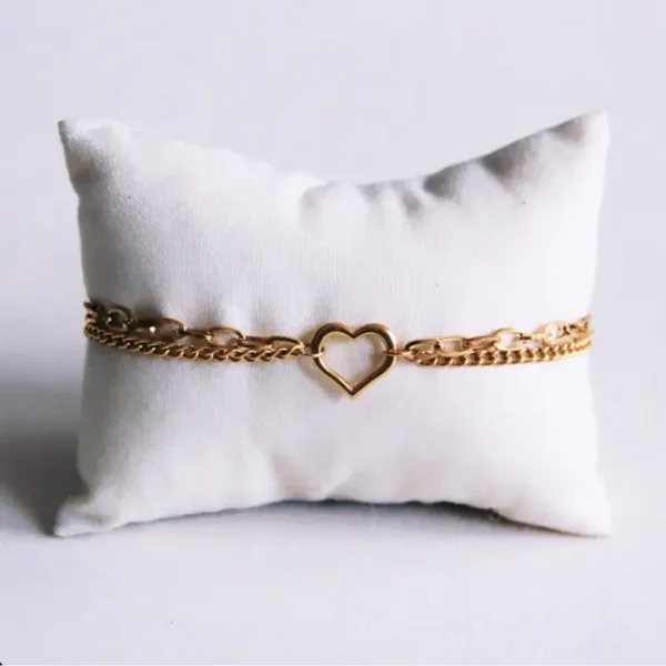 Dubbel schakelarmbandje met open hart - goud