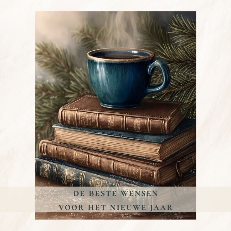 Oude boeken met blauwe mok - nieuwjaar