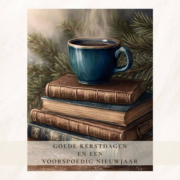 Oude boeken met blauwe mok - goede kerstdagen