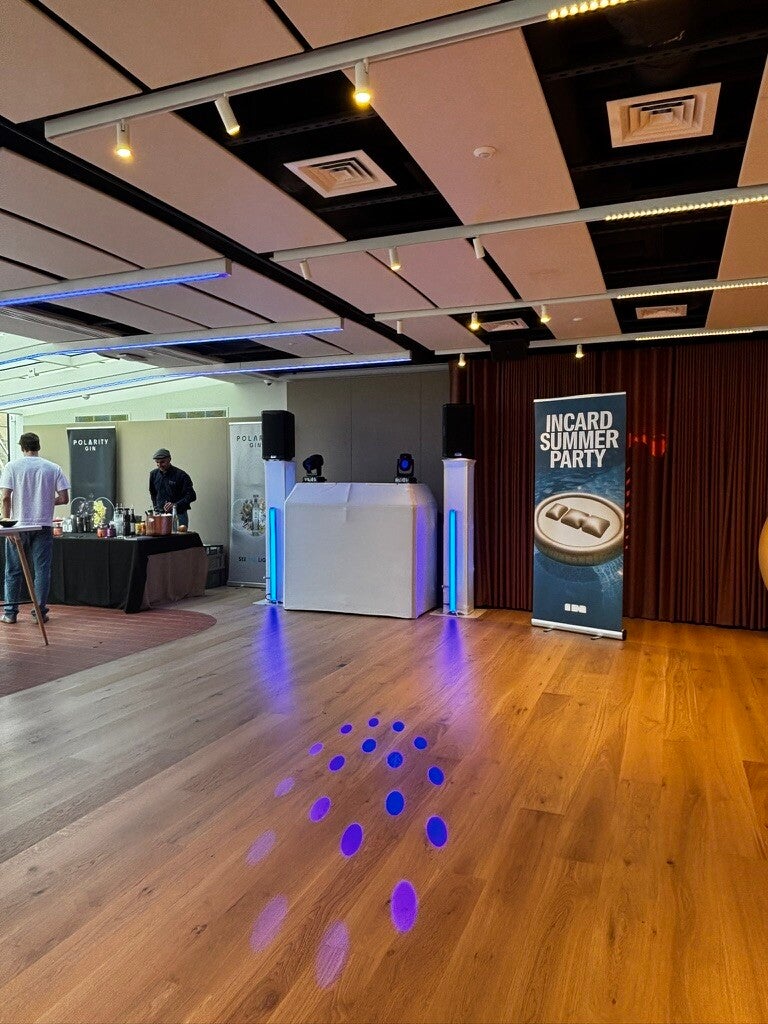 White MHX DJ setup and INcard Summer Party banner at The Line, Victoria Embankment
