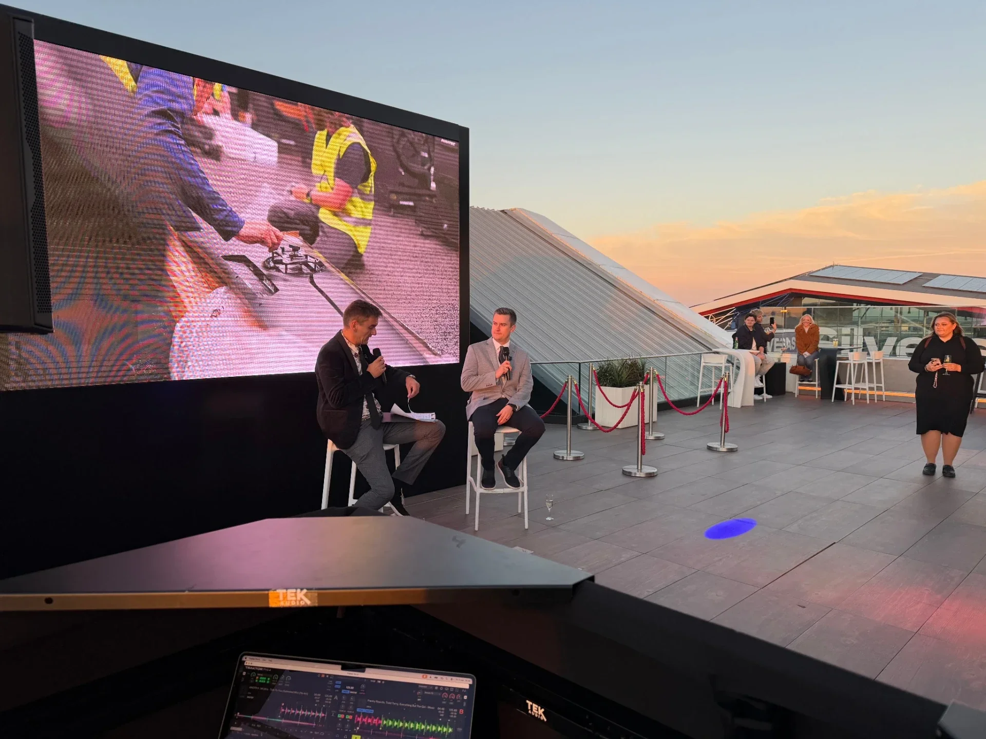 A presentation during a corporate event on the Hilton Garden Inn Silverstone rooftop