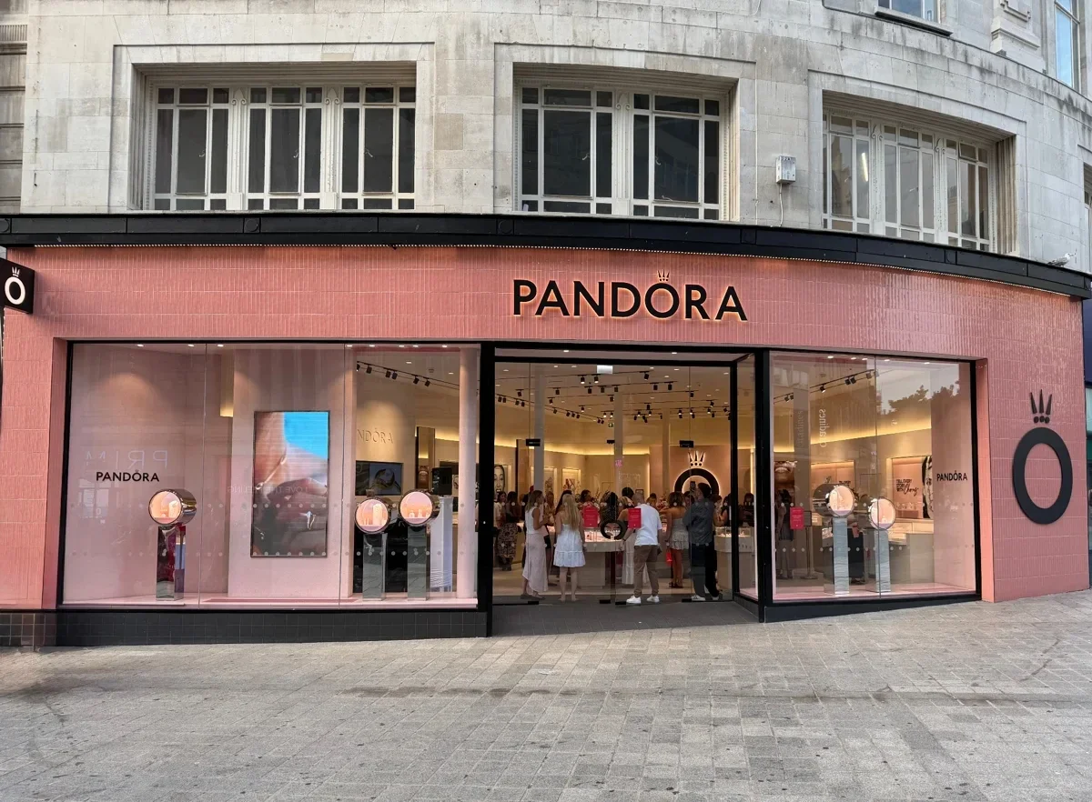 Pandora store frontage with guests inside during a retail event