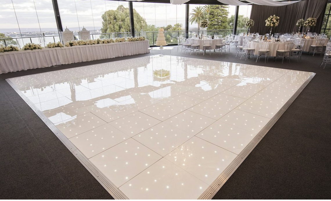 White starlit LED dancefloor available as an enhancement for an MHX wedding DJ package