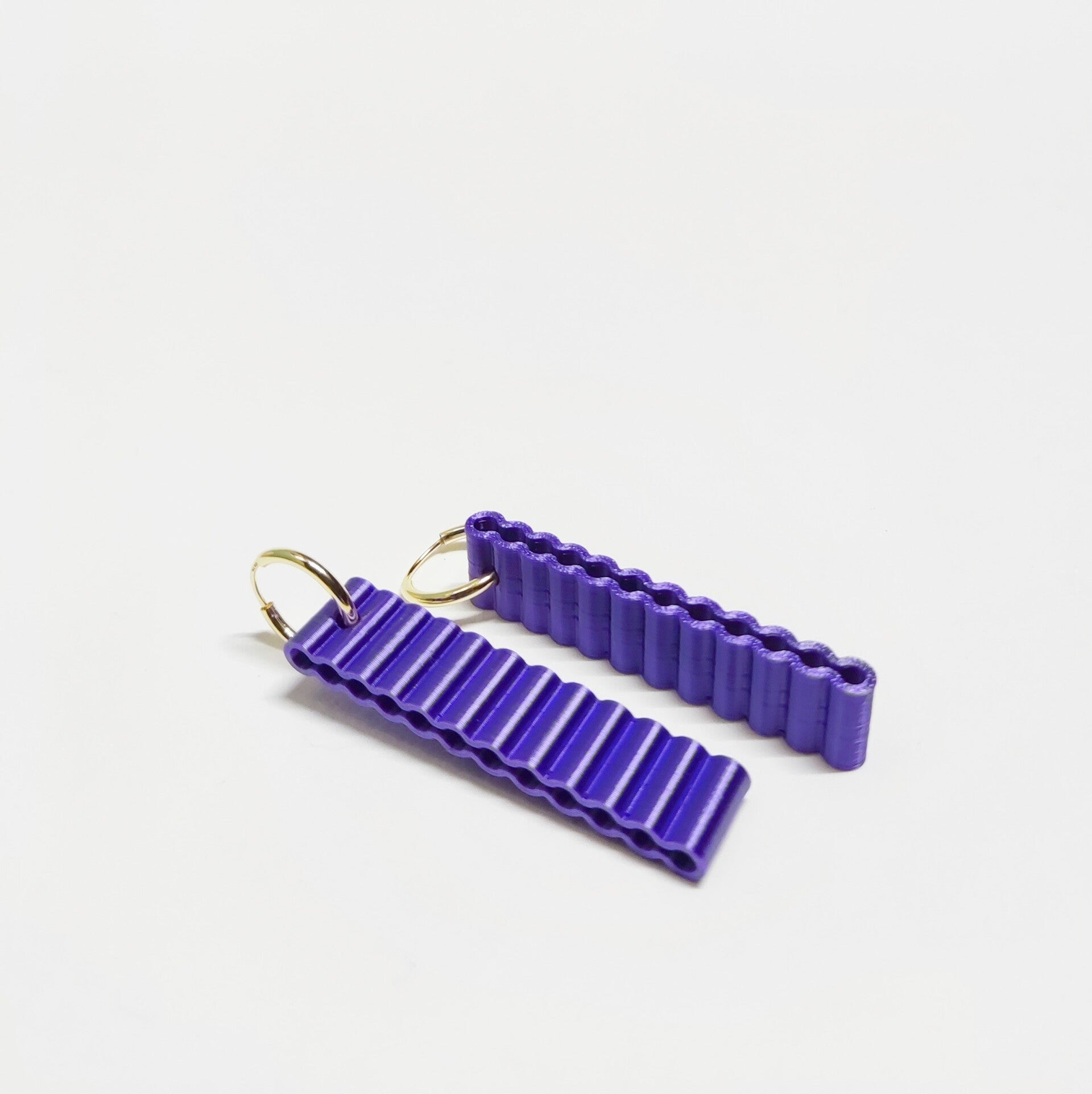 Tube oorringen - paars