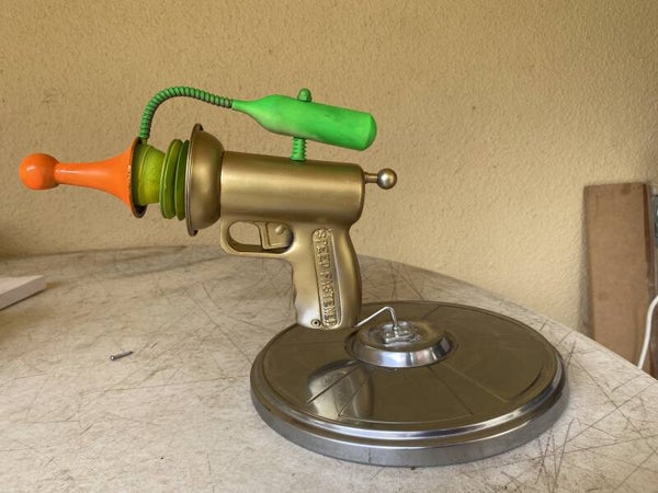 RAYGUN NOVELTY HANDMADE WITH RECYCLED MATERIALS ARTWORK