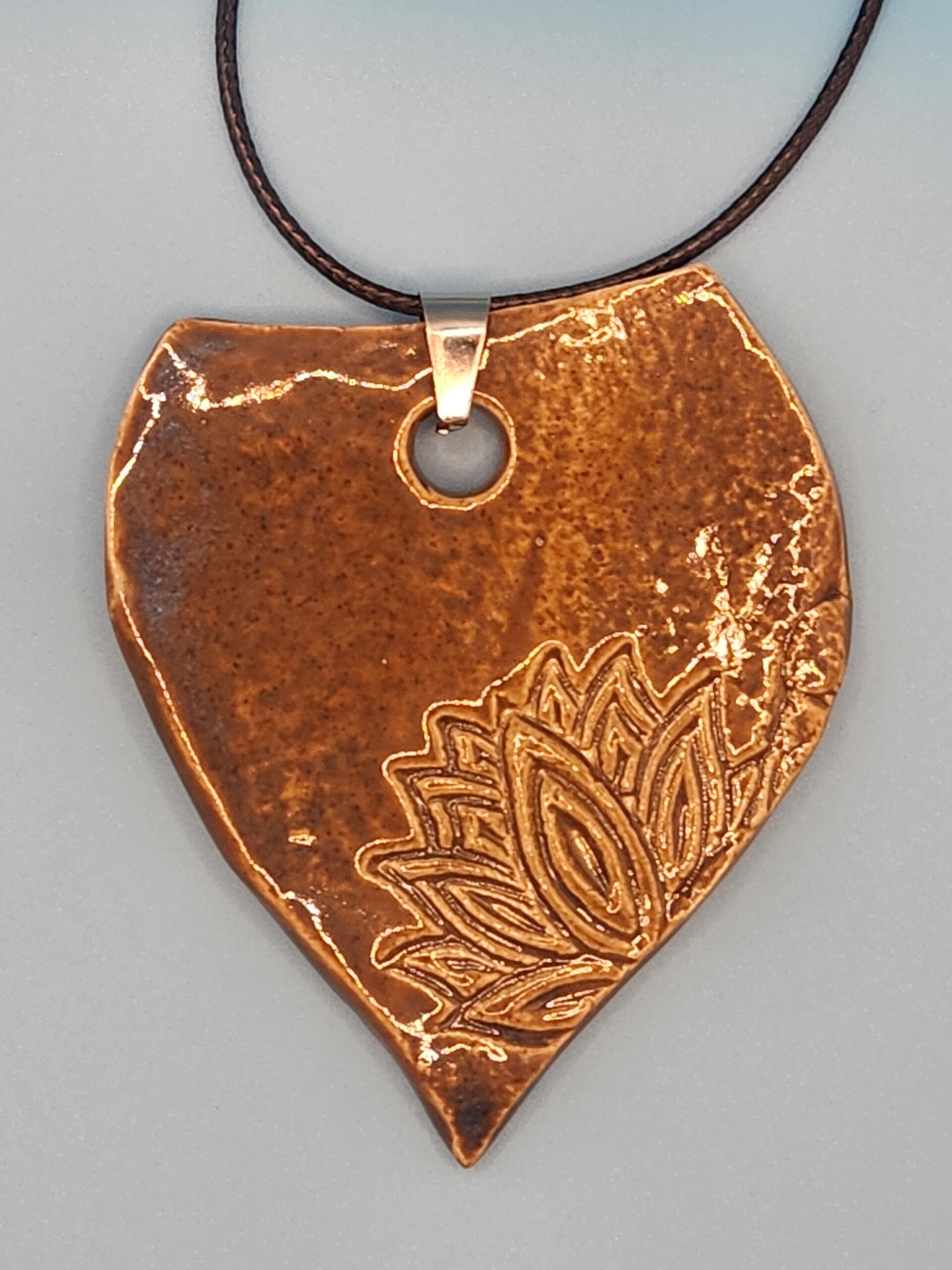 Lotus pendant; earthy brown glaze