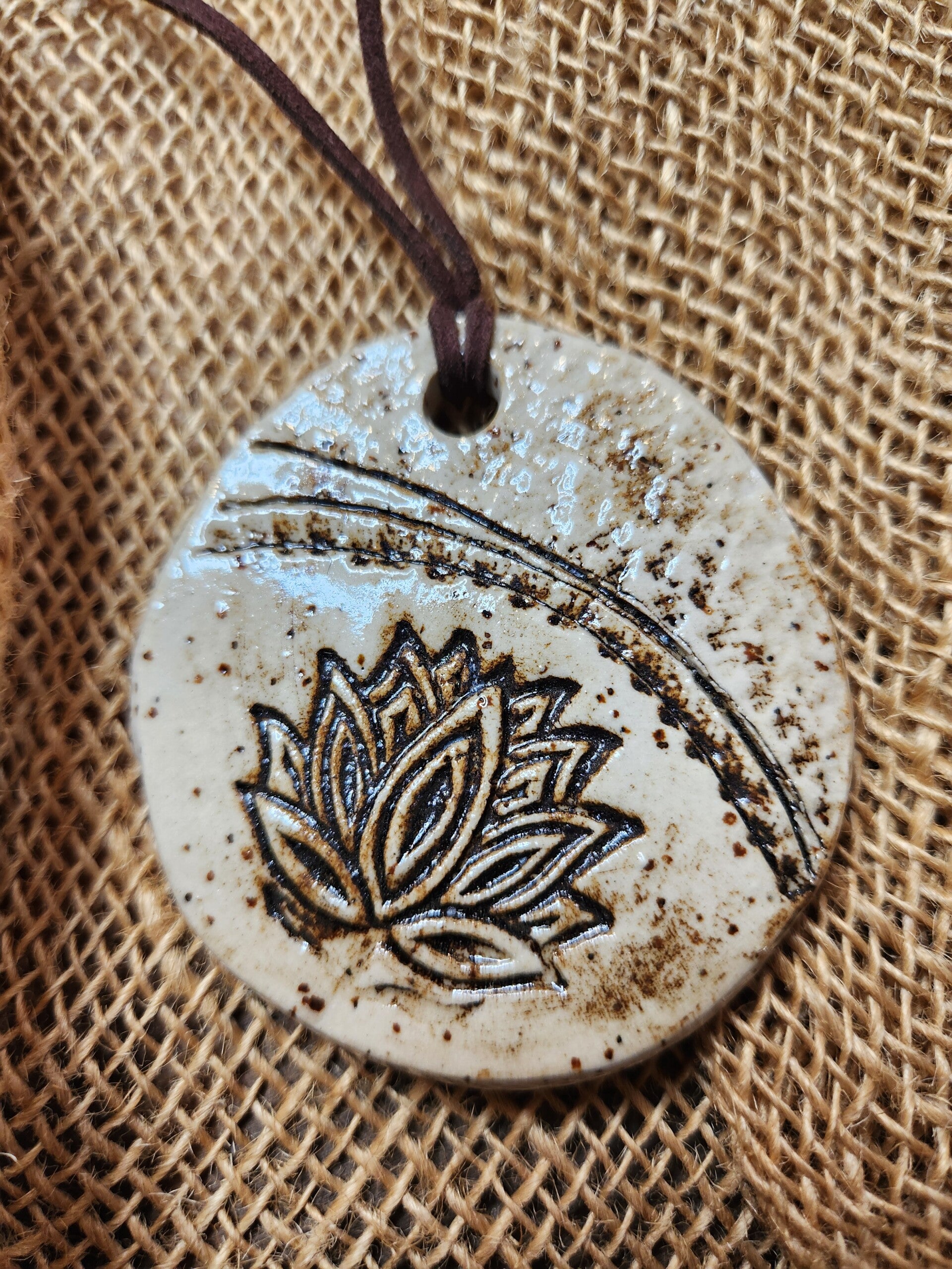 Oval lotus flower pendant