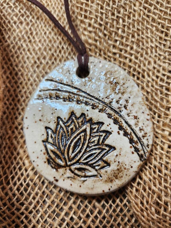 Oval lotus flower pendant