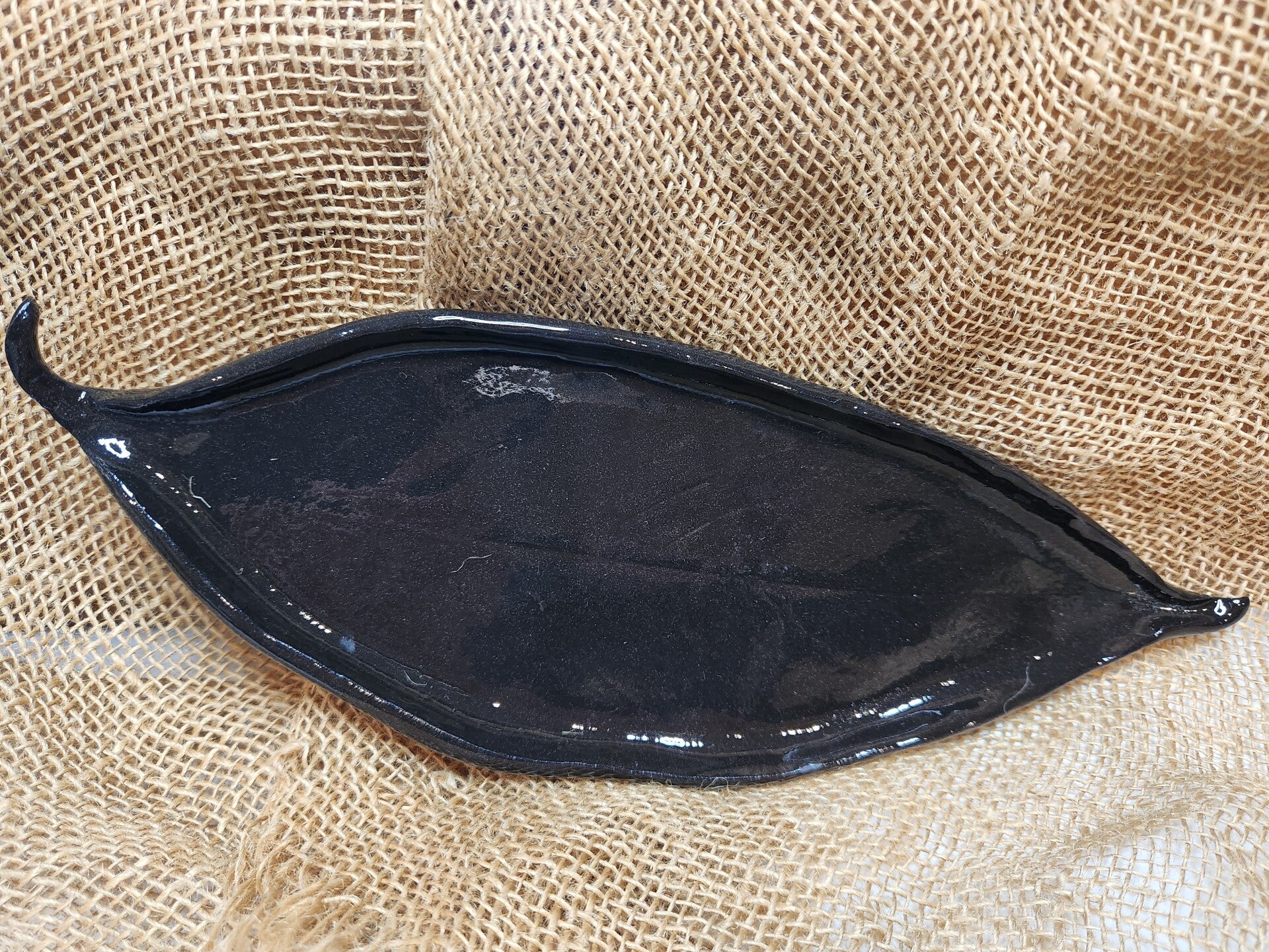 Black "leaf" shaped dish