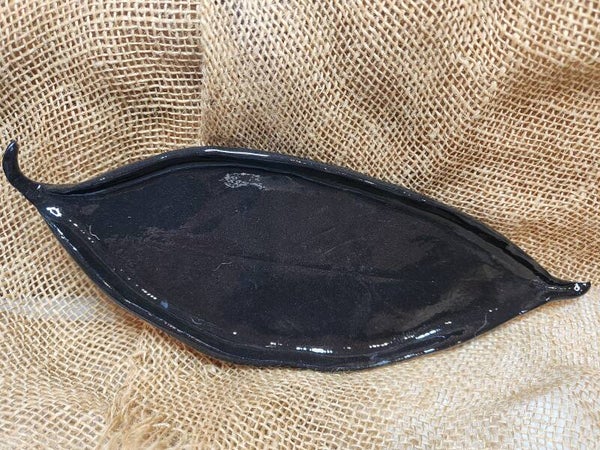 Black "leaf" shaped dish