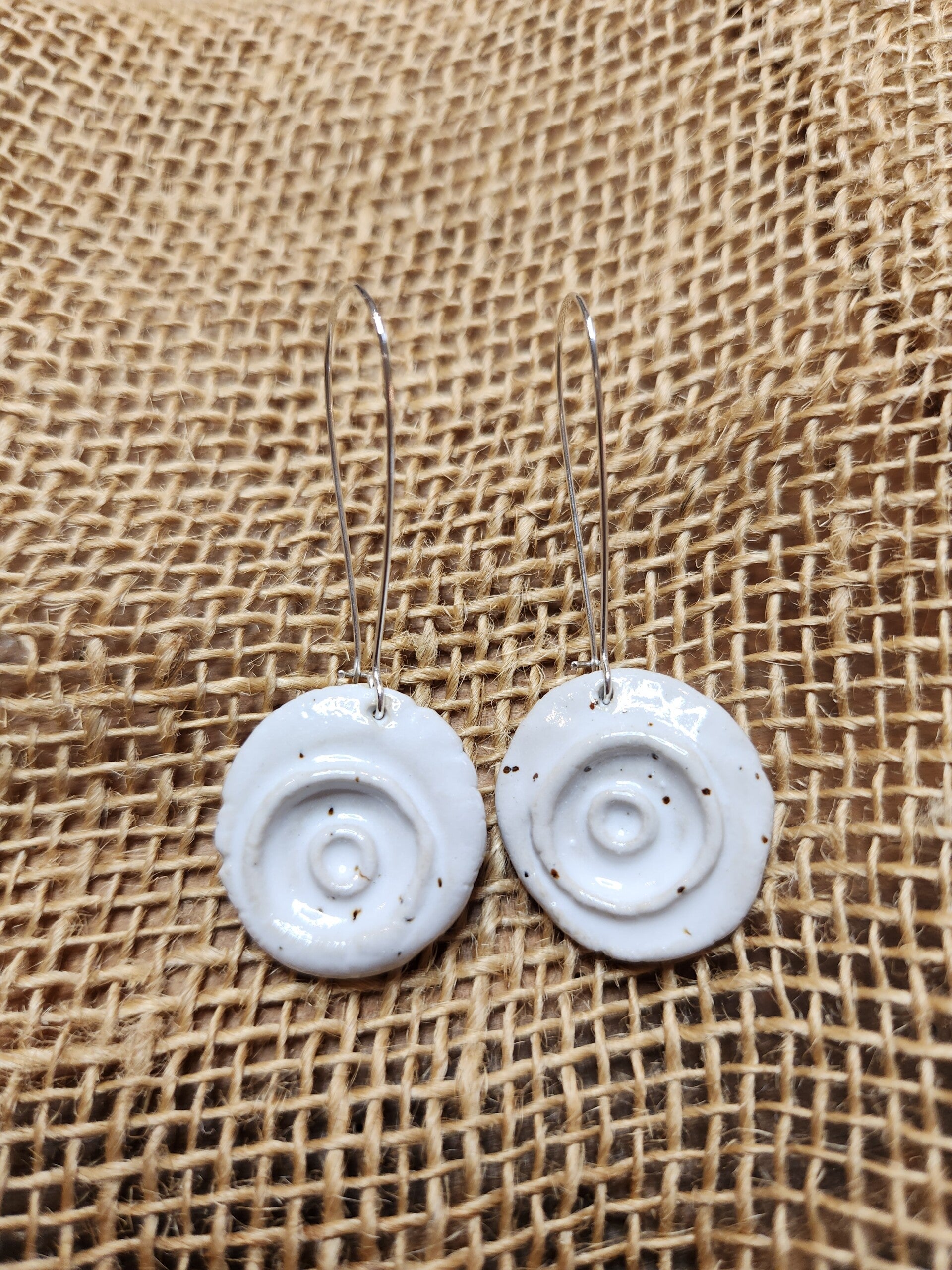 White earrings