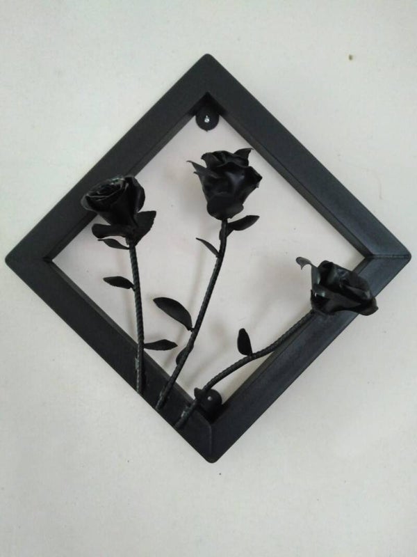 Jolie applique murale avec des roses forgés