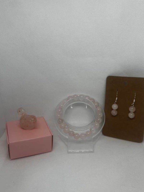 Bracelet et boucles d’oreilles fantaisie roses avec oiseau décoratif