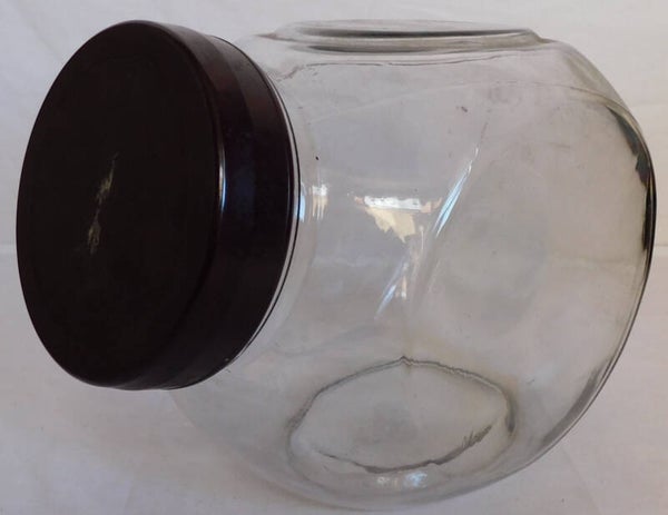 Glazen snoeppot pot met bakeliet deksel.