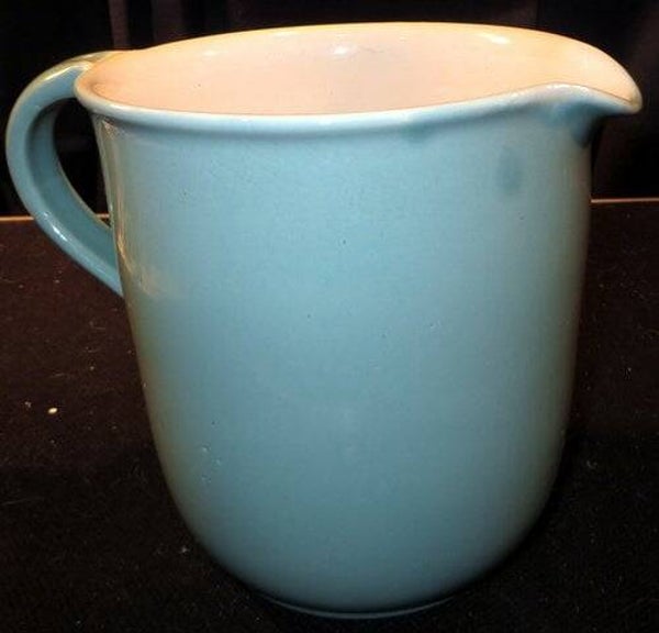 Brocante aardewerk pastel schenkkan