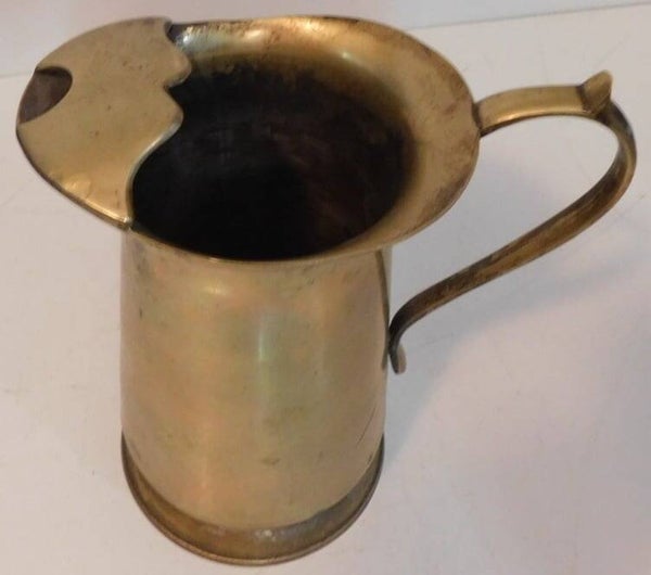 Antieke messing schenkkan