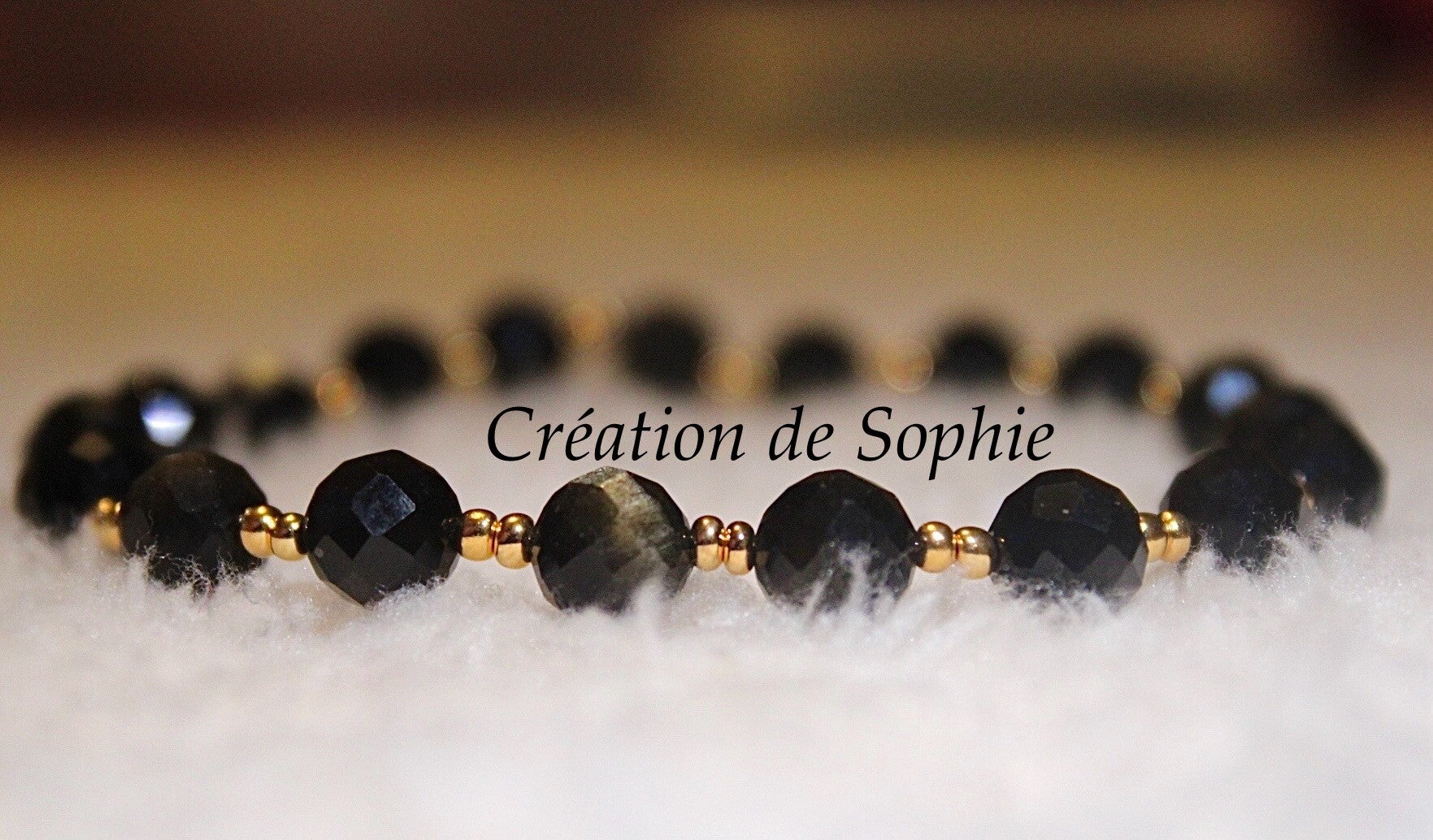 Bracelet obsidienne dorée à facette