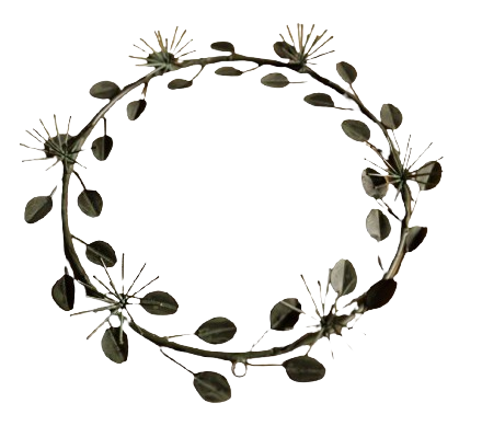 Blomsterkrans i patineret metal