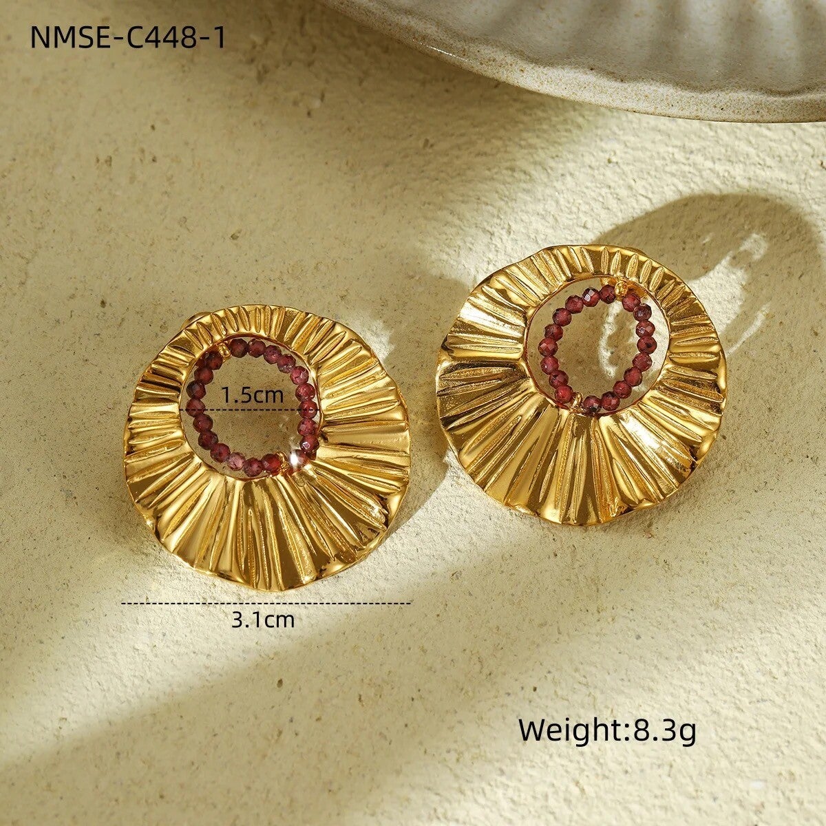 Boucle d’oreilles en forme de soleil