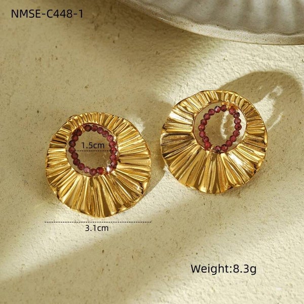 Boucle d’oreilles en forme de soleil