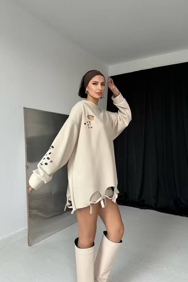 Blouse découpée au laser beige