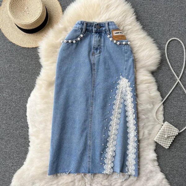 Jupe mi-longue taille haute avec ourlet