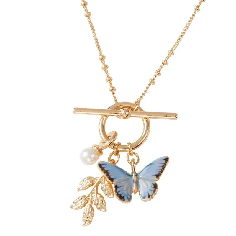 Collier, boucles d'oreilles et bague en papillon