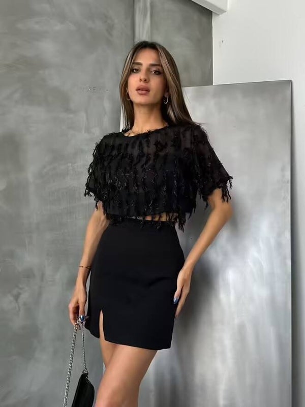 Blouse noire à franges pailletées