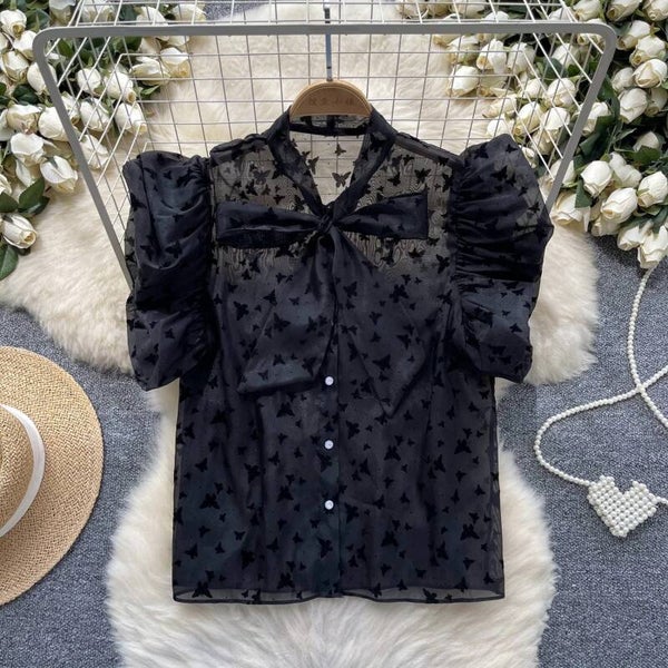 Chemise transparent motif papillon