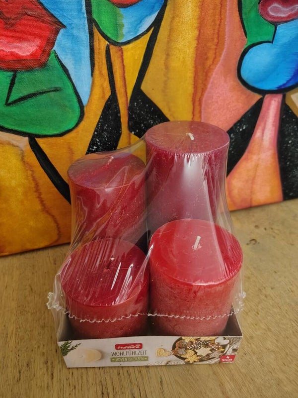 De rode  "Wohlfühlzeit Adventskerzen" set
