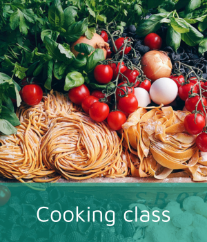 Fresh pasta and vegetables ready for cooking class.