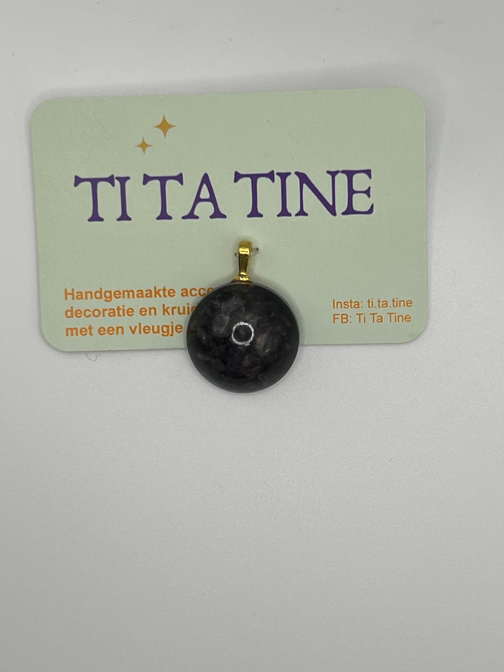 Bolle hanger zwart met amethiststeentjes