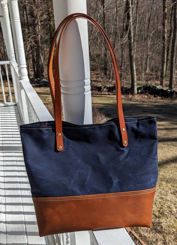 Leather and waxed canvas tote bags