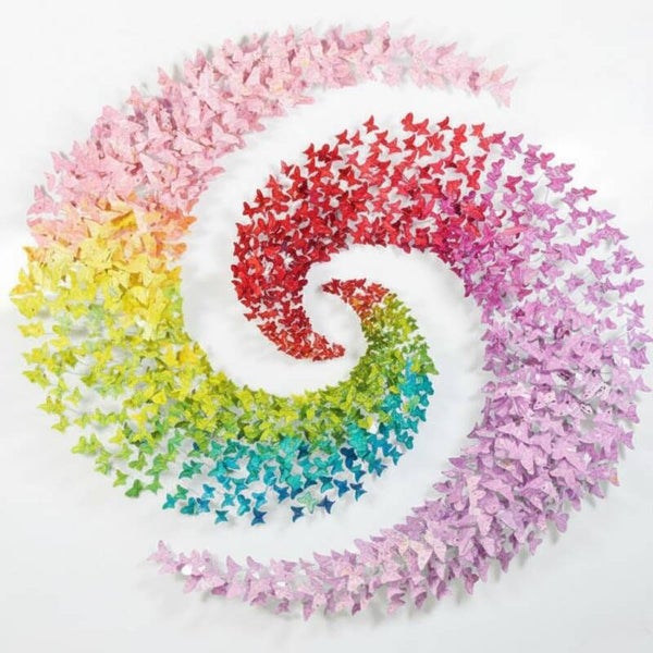 Spiral butterfly wall art · Colourful butterfly installation