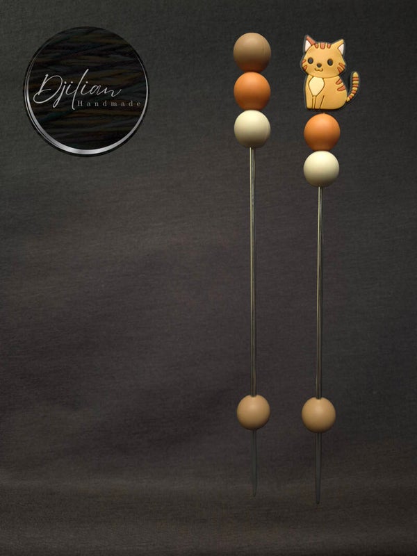 1 set van 2 ami-sticks - oranje gestreepte kat