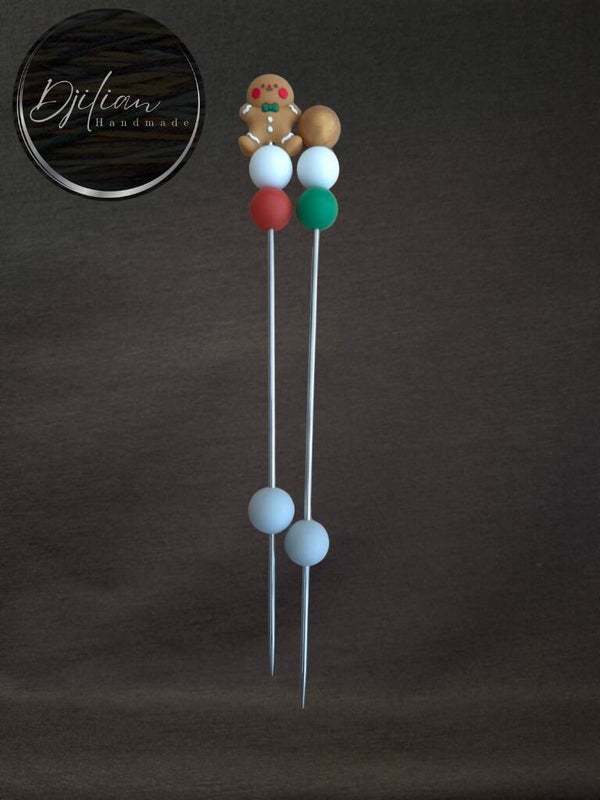 1 set van 2 ami-sticks - Kerstthema gembermannetje