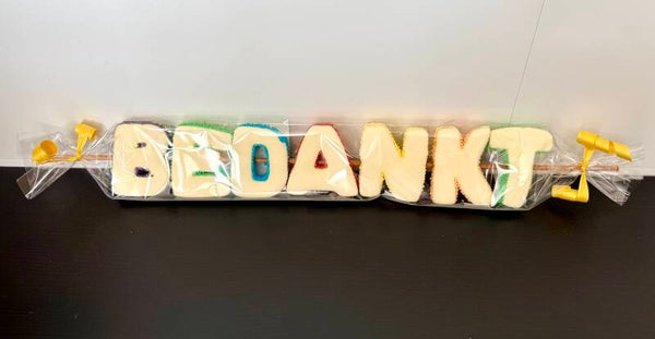 Spek letters “BEDANKT”