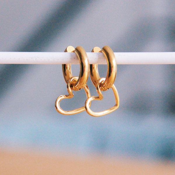 Brede creool met open hart - goud