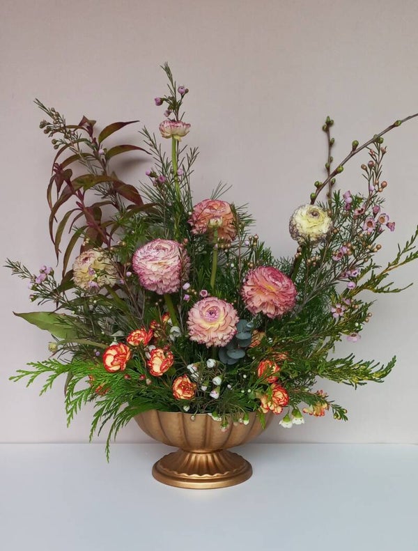 Bloemenarangement met Ranunculus