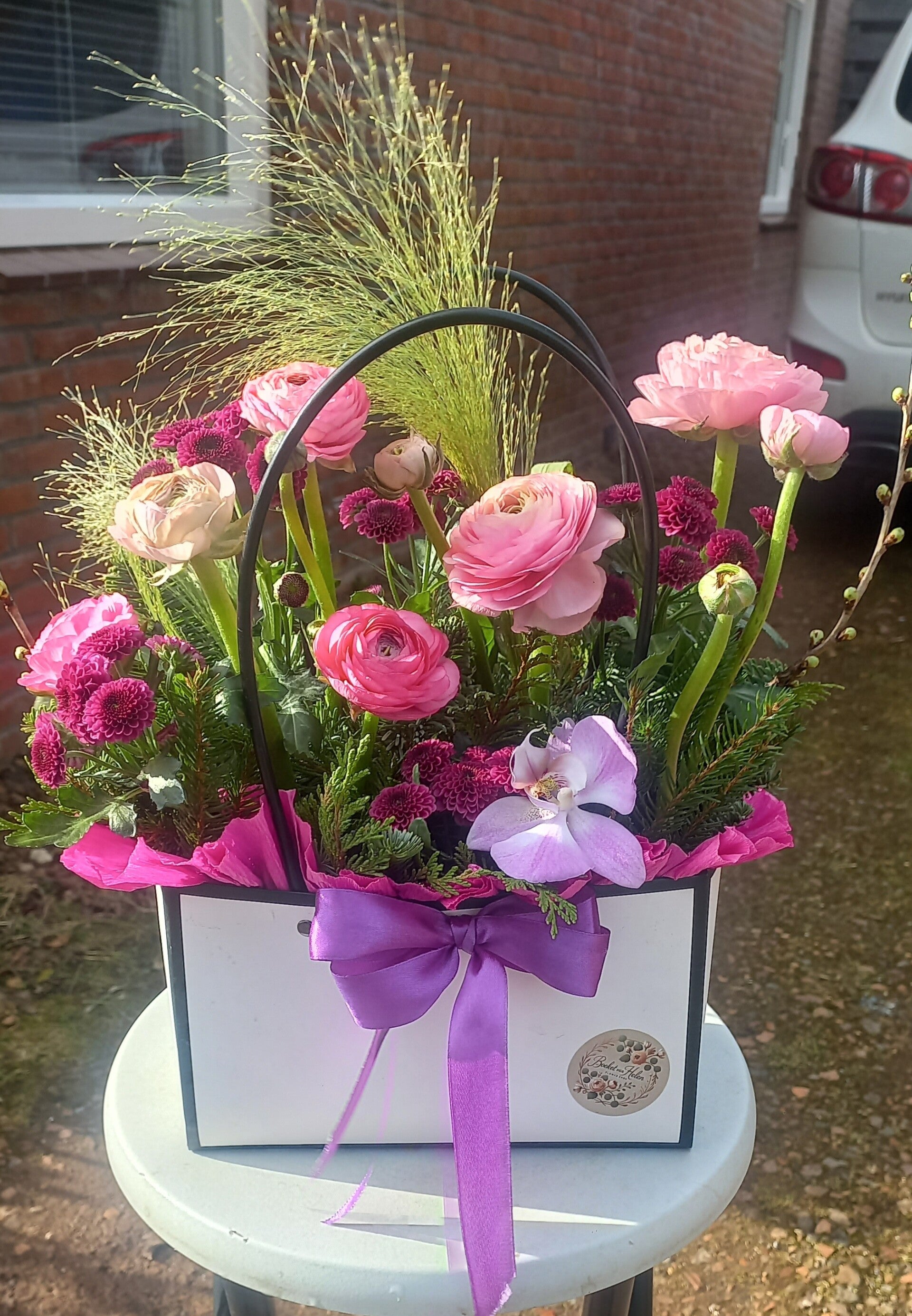 Bloemen in tasje