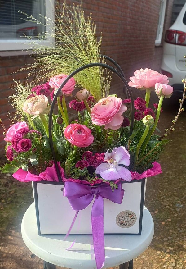 Bloemen in tasje
