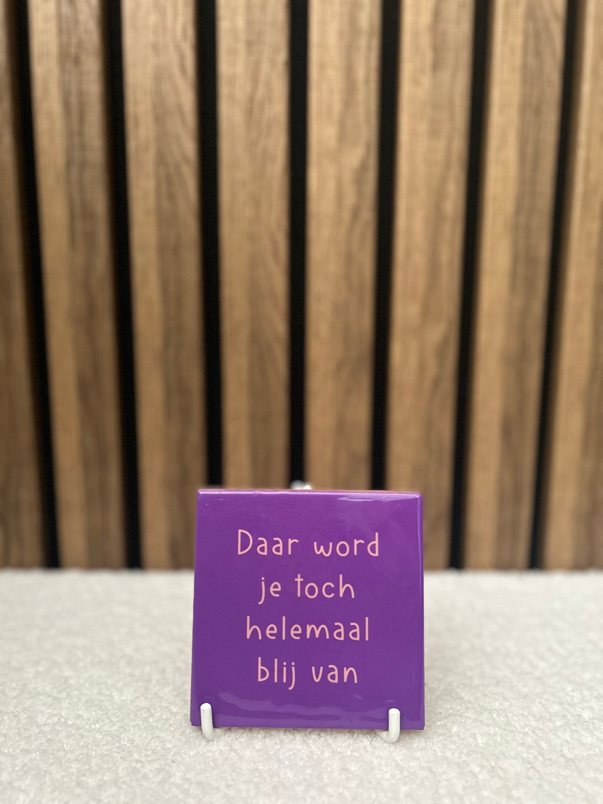 Tegeltje helemaal blij