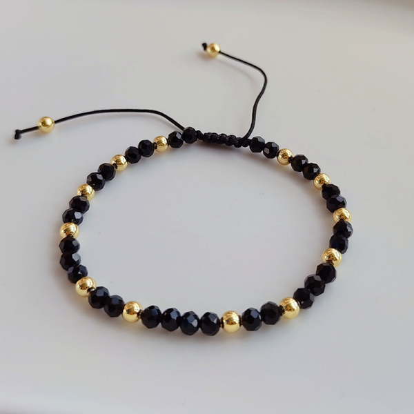 Bracelet perles noire et or