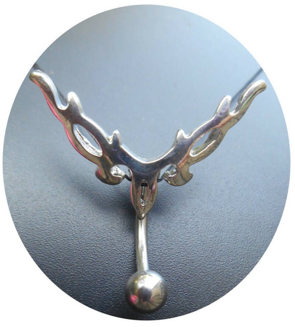 [14053]  Reverse tribal navelpiercing 