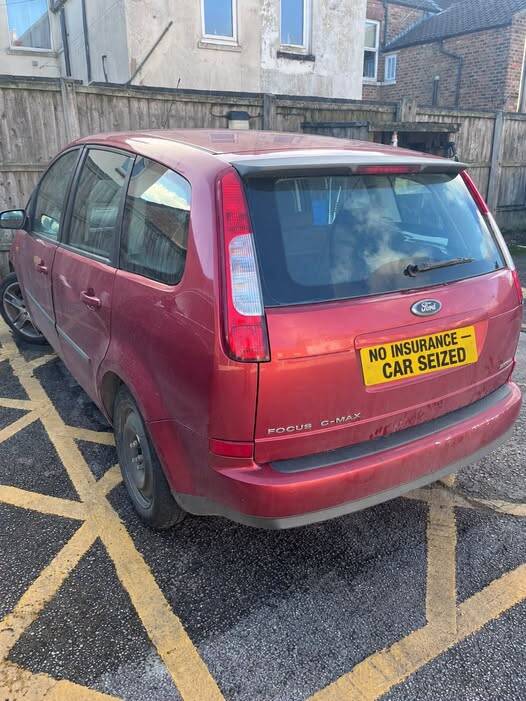 Red Ford Focus C‑Max seized by Humberside Police in Bridlington after driver abandoned vehicle and was found with no licence, insurance, or MOT