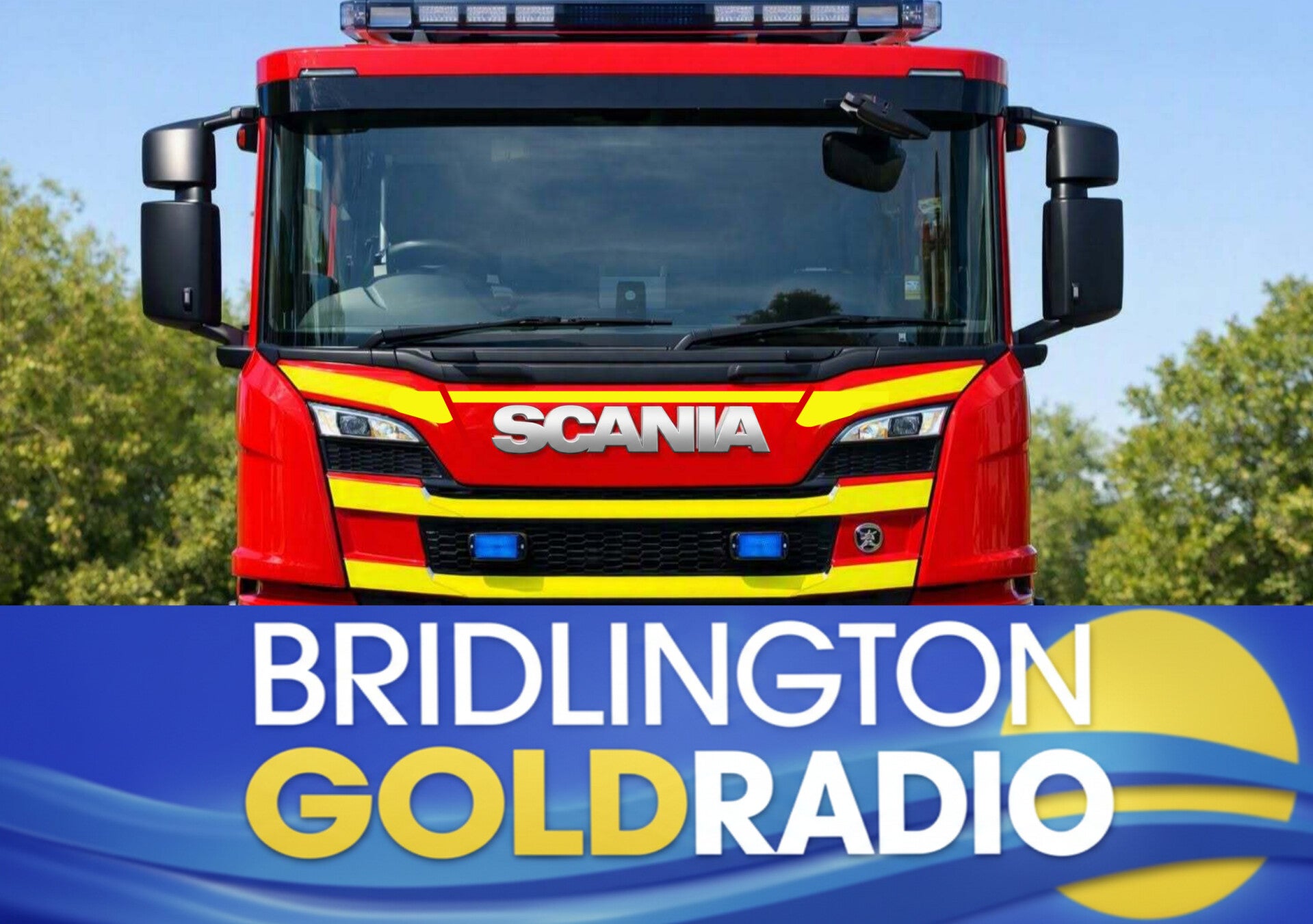 Front view of a Humberside Fire & Rescue Service Scania P360 fire engine parked in daylight, showing bright red bodywork with yellow reflective stripes, blue emergency lights, and the silver SCANIA logo above the grille.