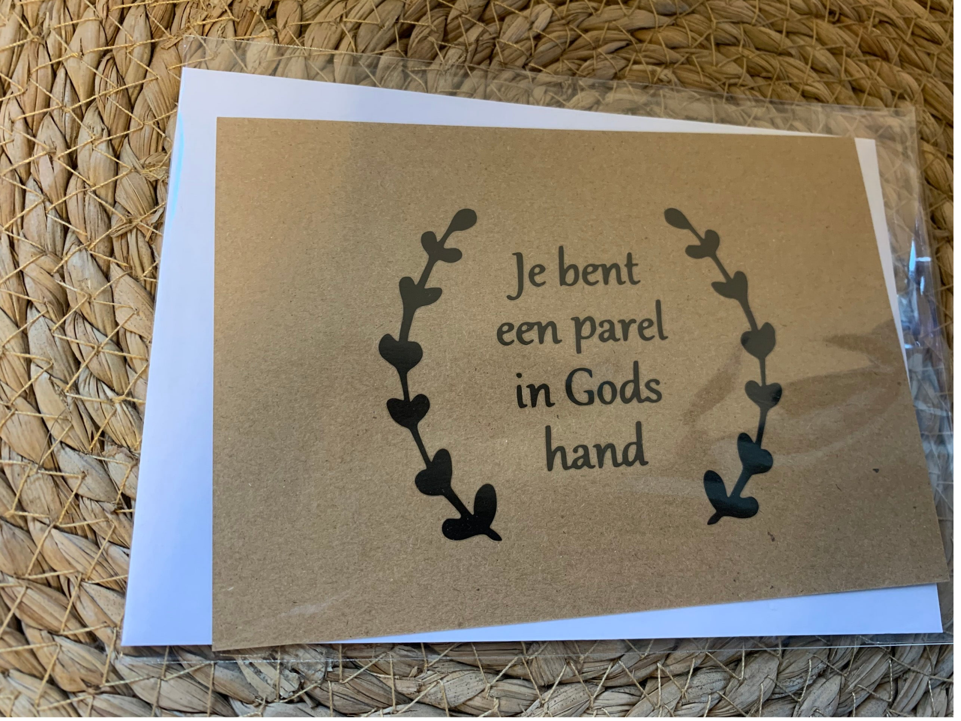 Enkele kaart parel in Gods hand