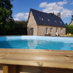 Enjoy the outdoor pool at Maison de la Grange, Normandy