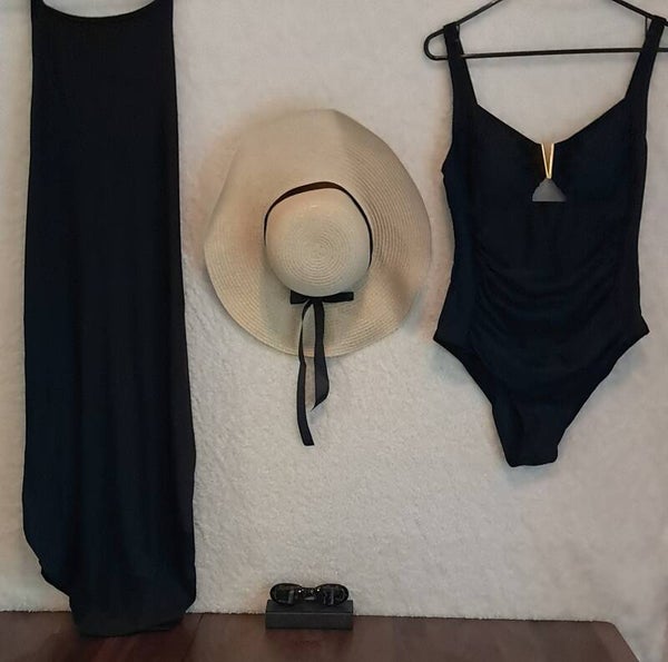 Women's black one-piece bathing suit box.
