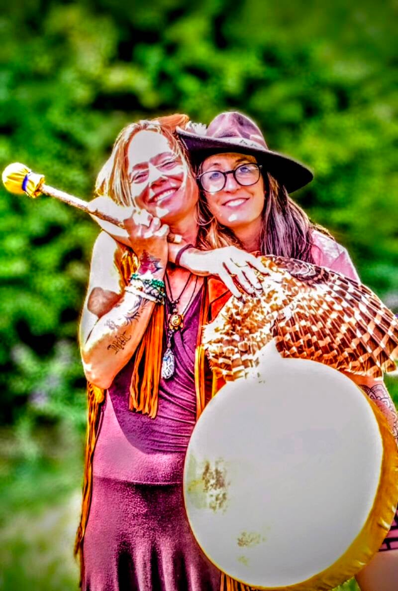 Spiritual sisters, holding shamanic tools for healing, expressing love for life